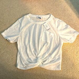 Never worn Bebe crop top knotted front tee